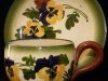 Watcombe Pottery Cup and Saucer with Pansies in Faience pattern