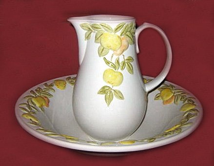 A lime & yellow wash bowl & jug