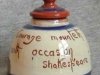 Watcombe Pottery Inkwell, with stopper, decorated with a Cottage, smaller size than standard and with Shakespeare quote