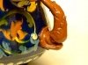 Longpark Pottery Jardiniere with elaborate Dolphin handles and scroll pattern on green ground