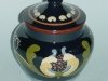 Longpark Pottery Tobacco Jar with art nouveau pattern on green ground