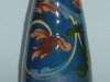 Longpark Pottery Vase with scroll decoration on blue ground