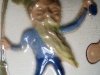 Aller Vale Pixy, holding a broom and a key, sprigged on a jug