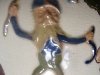 Aller Vale Pixy, holding a crook and a cutting-hook, sprigged on a jug