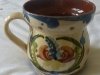 An Aller Vale Side-pour Jug decorated with a Scandy which has been modified with a Flower to the centre, 4