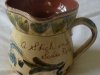 An Aller Vale Side-pour Jug decorated in Q1 with a spelling error in the motto, 4