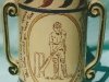 Aller Vale Pottery. Commemorating WG Grace\'s 100th score of 100 runs or more, which was achieved in 1895. The reverse of this Loving Cup shows crossed cricket bats and a ball.
