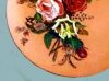 Torquay Terracotta Company. Plaque hand painted with flowers.