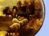 Torquay Terracotta Company. Hand painted plaque with a farm cart and sheep.