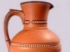Torquay Terracotta Company. A terracotta ribbed jug.