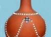 Torquay Terracotta Company. A turned and enamel decorated vase.