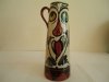 Tor Vale Pottery Jug decorated with a nightmarish face