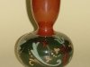 Watcombe Vase with partial scroll decoration on green ground